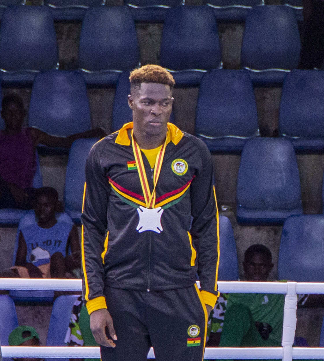 Ghanaian boxer Abubakar Kamoko with his medal at the 2023 African Games in Accra.
